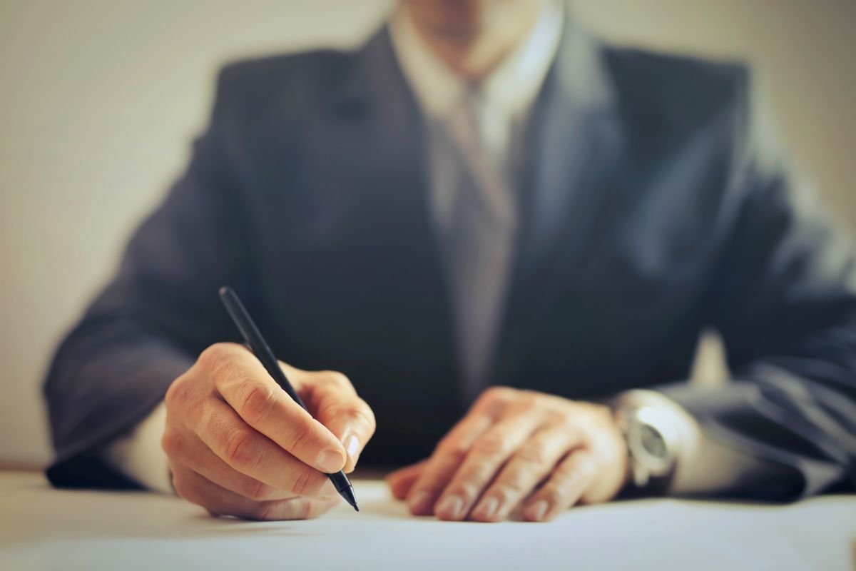 Businessman signing an ERP vendor contract