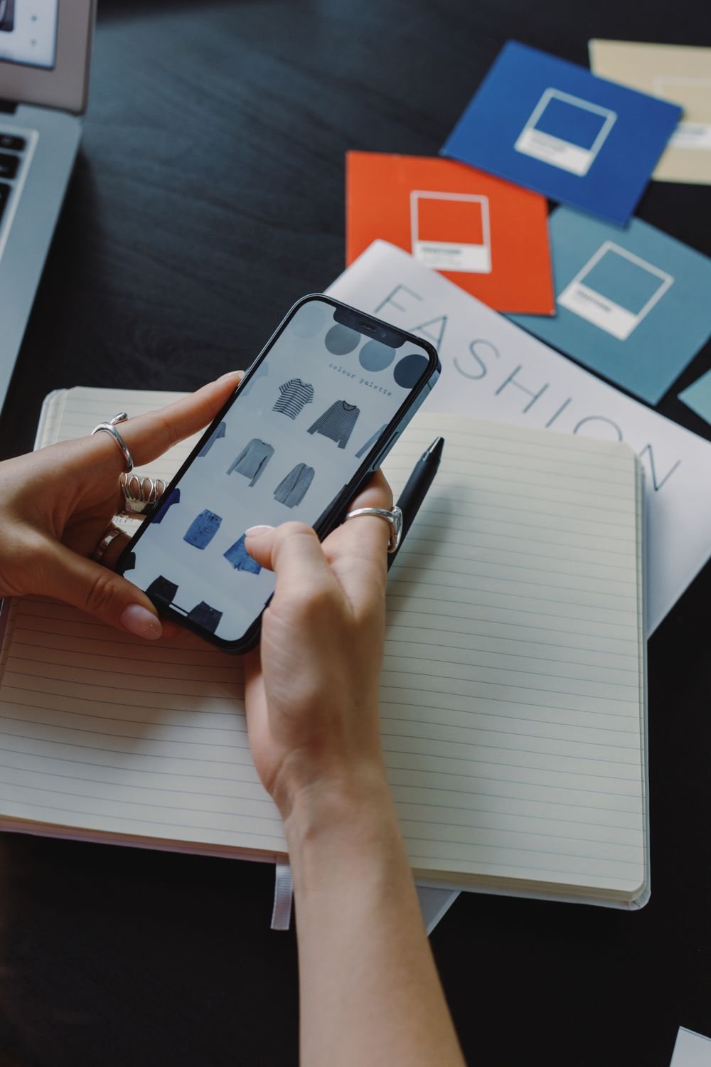Person browsing fashion products on a smartphone