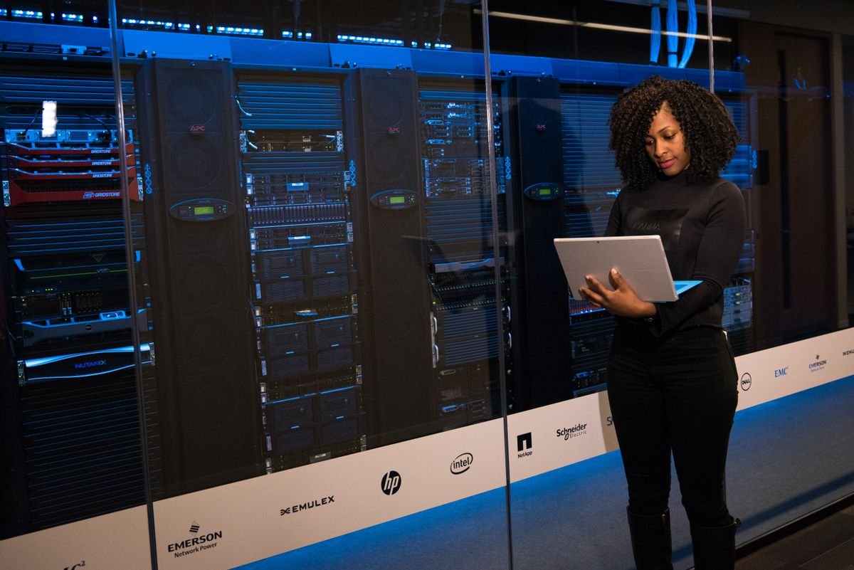 Female engineer monitoring centralized data servers in a modern server room, Notoriti MDM ERP